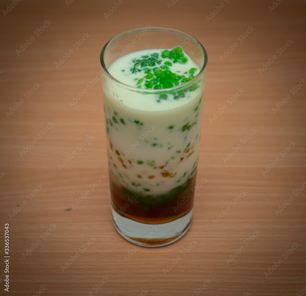 Ramadan food and drinks concept. Dates fruit in a bowl on wooden table background. Ramadan food and drinks concept. Dates fruit in a bowl on wooden table background.