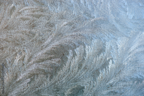 Background with pattern of ice crystals on glass