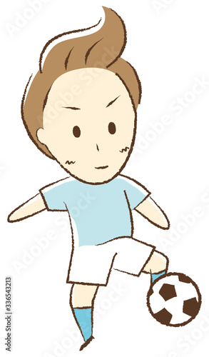 サッカーをする少年　トラップ