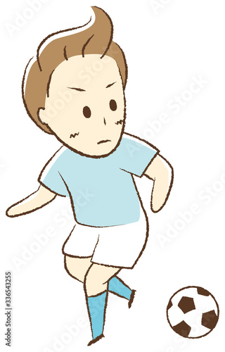 サッカーをする少年　ドリブル