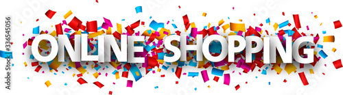 Big white online shopping sign on confetti background.