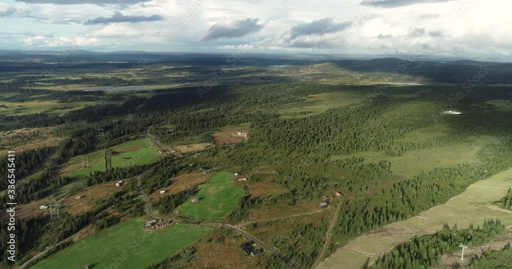 Spectacular aerial view of forest and lakes on flat pane of oyer. Drone fles towards meteorological tower. Spectacular aerial view of forest and lakes on flat pane of oyer. Drone fles towards meteorological tower.