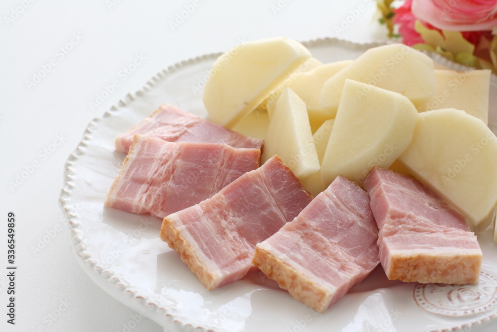 Chopped bacon and potato on dish for cooking ingredient