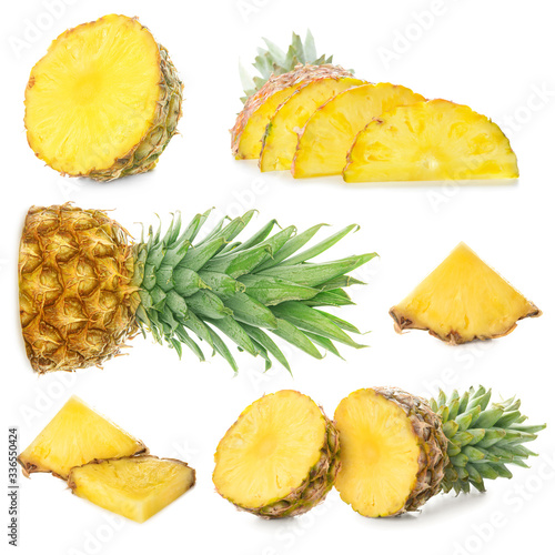 Set of fresh ripe pineapples on white background
