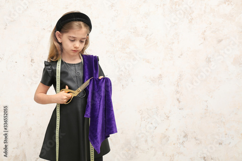 Cute little dressmaker on l...