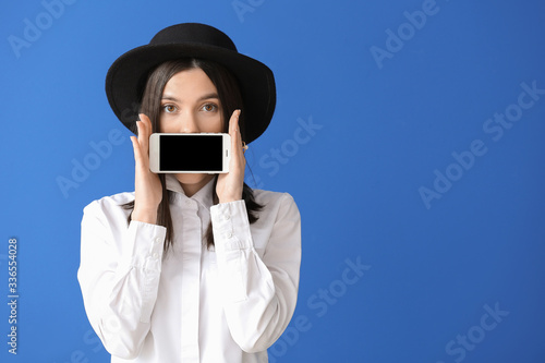 Beautiful young woman with ...