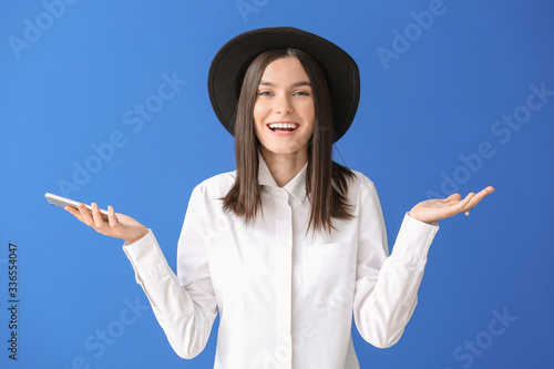 Beautiful young woman with ...