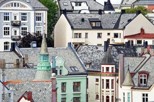 Fotografie A compressed view of rooftops and cupolas in Alesund, Norway.