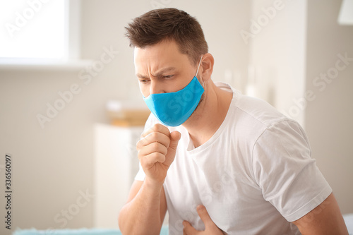 Ill man in protective medic...