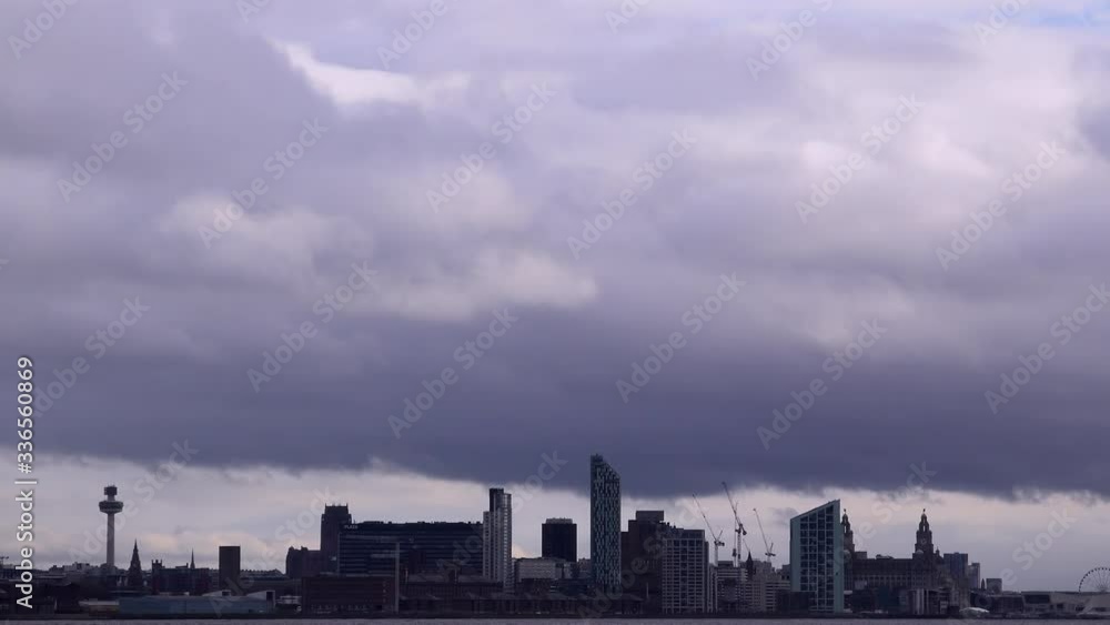 Dark clouds over Liverpool city panoramic shot England UK Dark clouds over Liverpool city panoramic shot England UK