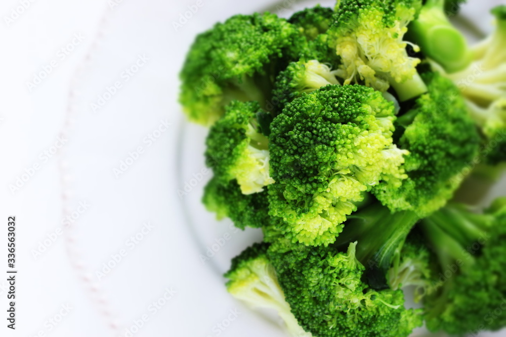 Boiled broccoli on dish with copy space Boiled broccoli on dish with copy space
