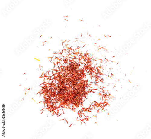 Dried safflower isolated on white background. Top view photo