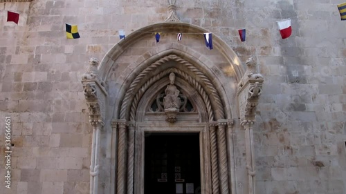 Cathedral of Saint Mark doorway in Korcula old town, Croatia. Korcula is a historic fortified town on the protected east coast of the island of Korcula