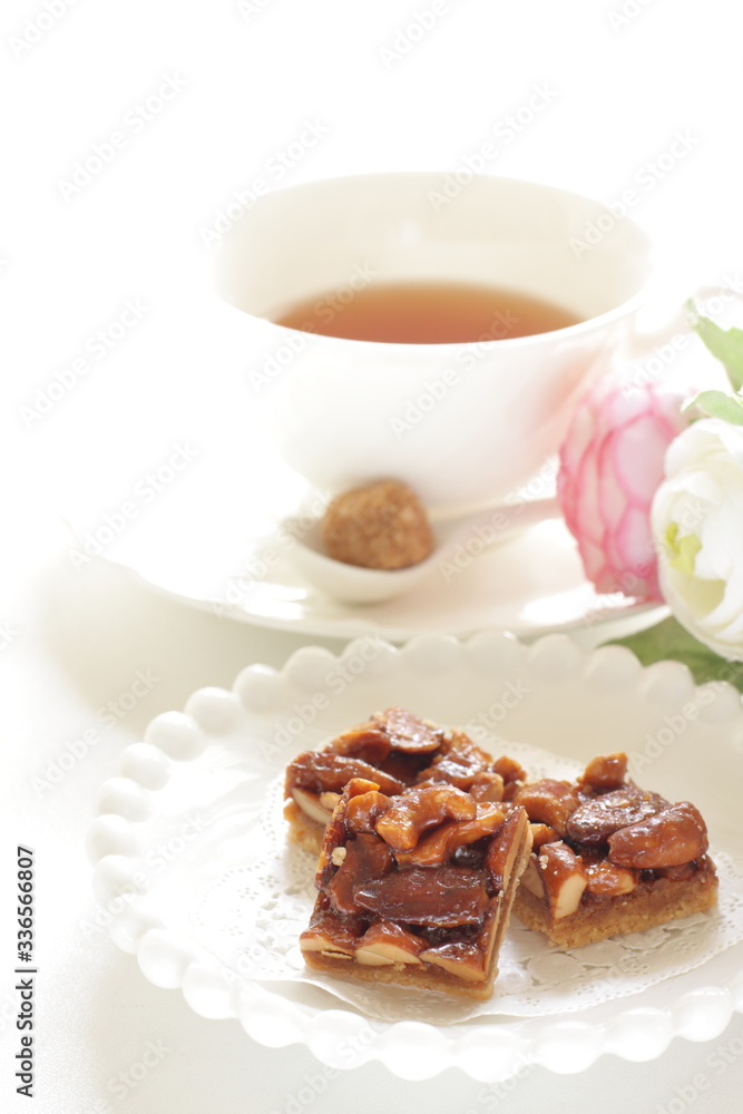Mixed nuts and cookie on plate with copy space Mixed nuts and cookie on plate with copy space