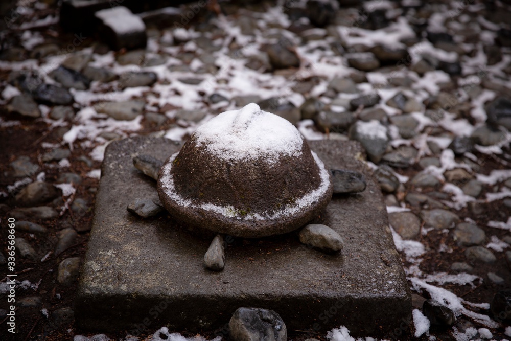 snow covered stone turtle snow covered stone turtle