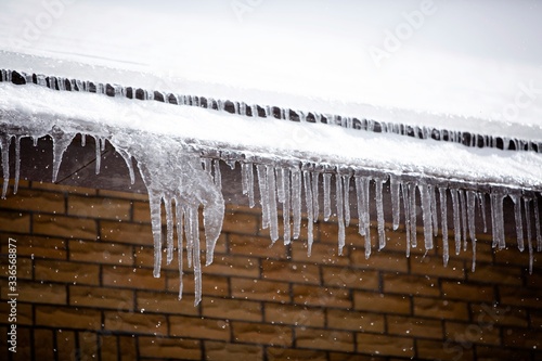 icicles hanging from a roof