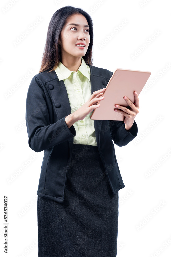 Asian businesswoman standing while using tablet Asian businesswoman standing while using tablet