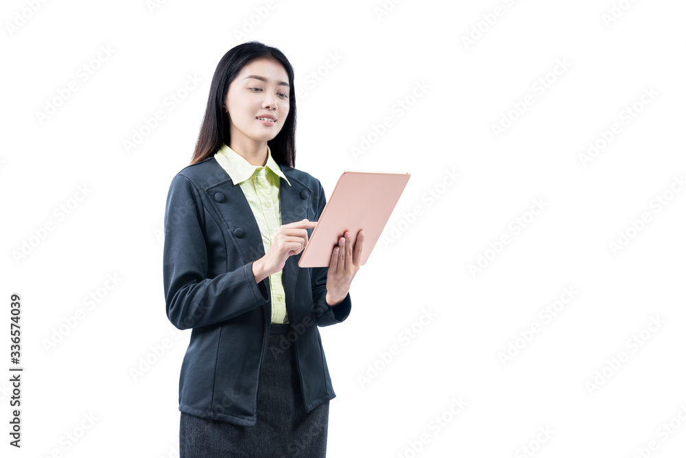 Asian businesswoman standing while using tablet Asian businesswoman standing while using tablet