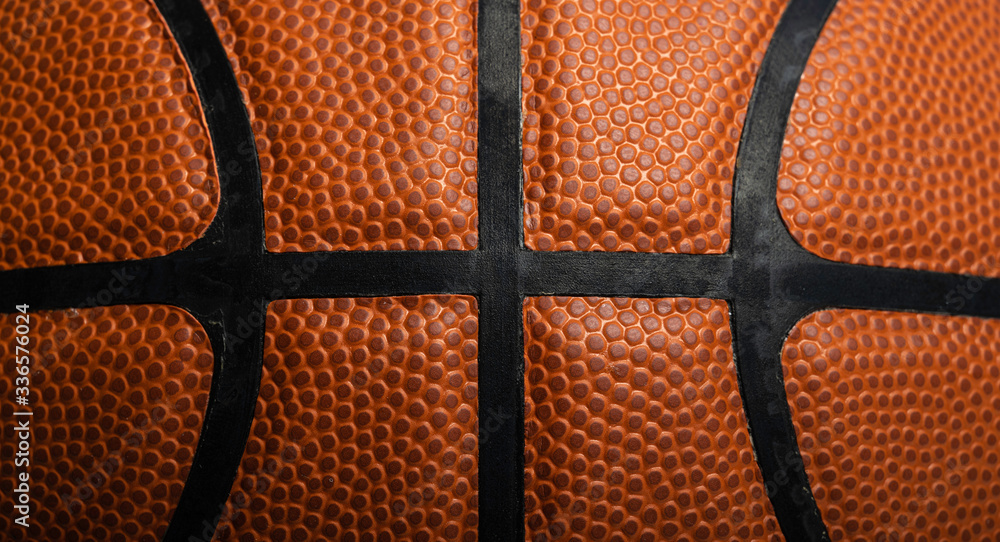 Obraz premium A close-up of a leather basketball on white
