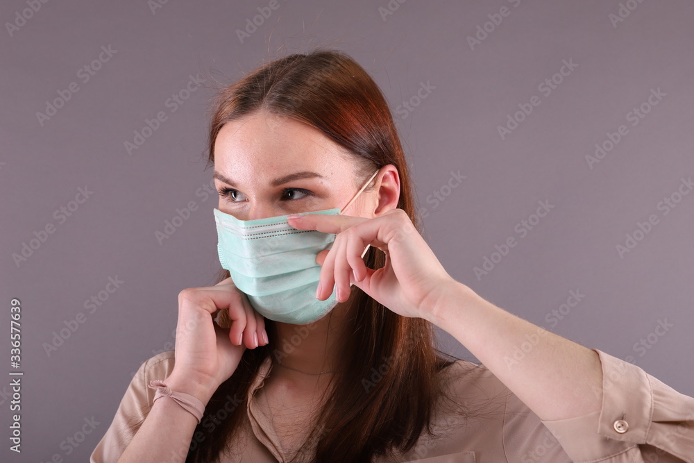 Studio portrait of young woman wearing Surgical mask for protect Covid-19 (coronavirus) Studio portrait of young woman wearing Surgical mask for protect Covid-19 (coronavirus)