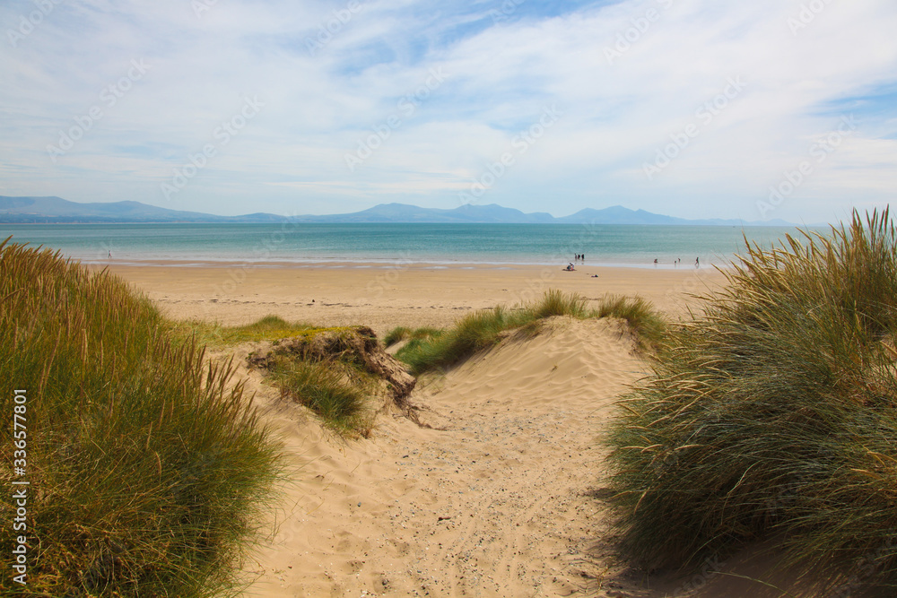 BEACH AND BLUE SKY, Newbourgh Beach, Wales, UK BEACH AND BLUE SKY, Newbourgh Beach, Wales, UK