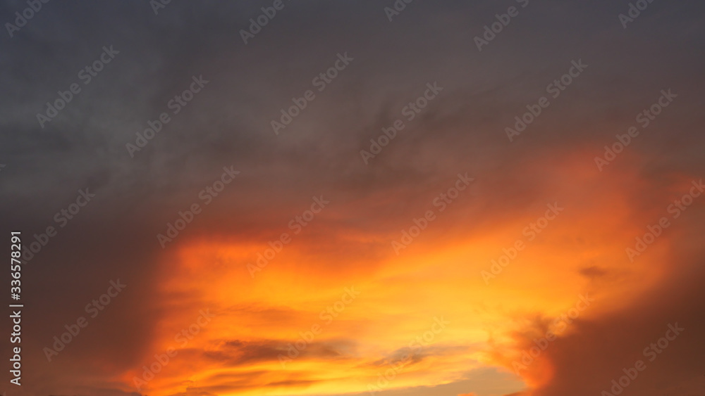 White cotton candy and Cumulus clouds on tropical blue sky at sunset, The horizon began to turn orange with purple and pink cloud at night, Dramatic cloudscape area
