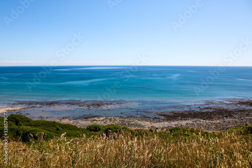 Blue sky coastal edge  beach  sea and blue skies