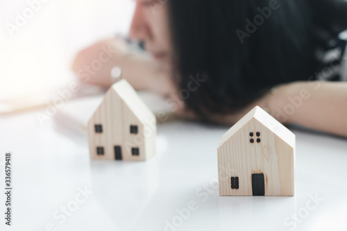Woman staying and working a...