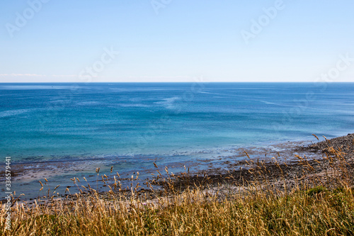 Blue sky coastal edge, beach, sea and blue skies