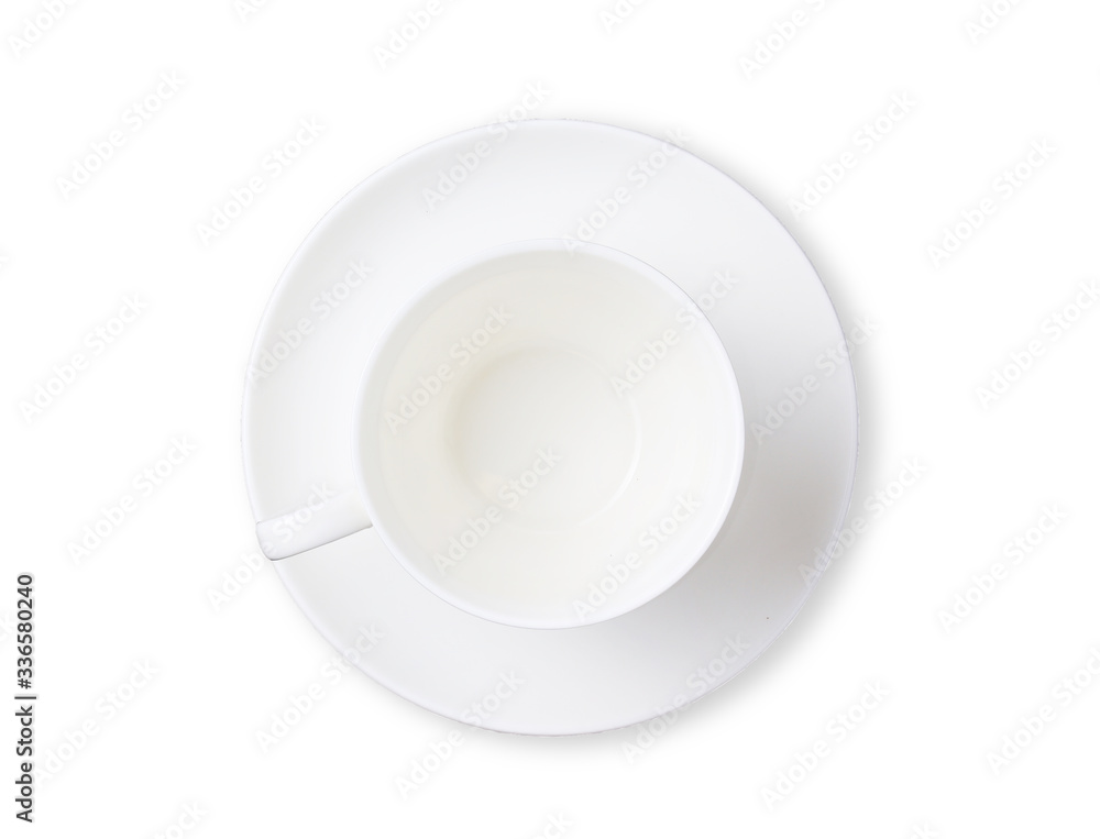 A white coffee cup placed on a saucer isolated on a white background. Top view and clipping path A white coffee cup placed on a saucer isolated on a white background. Top view and clipping path