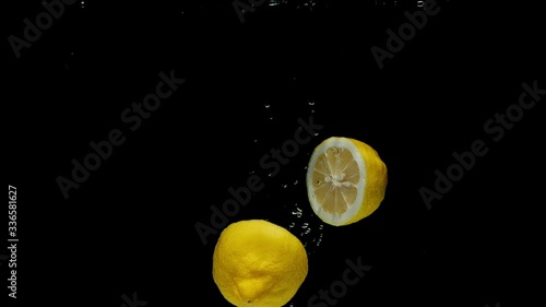 lemon drop in water slow motion