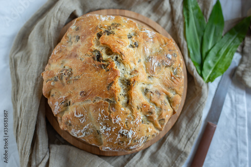 freshly baked home made no knead bread with wild garlic