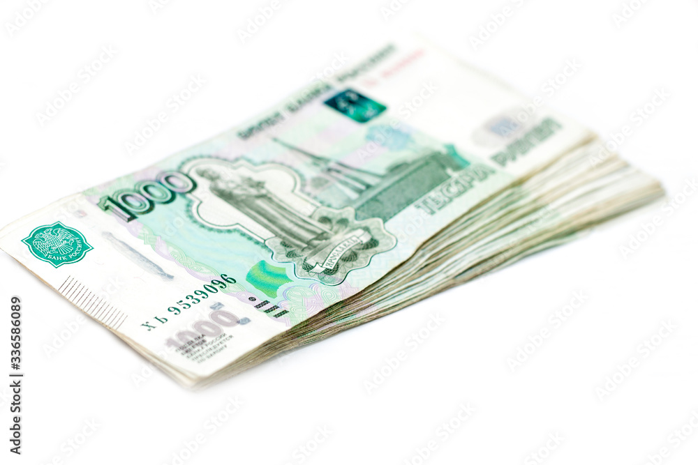Scattered Russian 1000 rubles banknotes closeup Scattered Russian 1000 rubles banknotes closeup