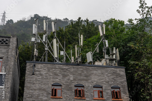 5G antenna base station on top of residence building in the mountain in Chongqing, China