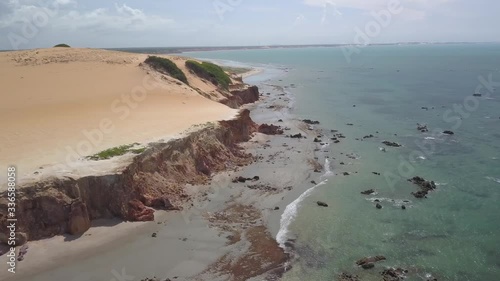 Wallpaper Mural Passeio na Praia de Canoa Quebrada passando por falésias avermelhadas até a Praia de Ponta Grossa no litoral leste do Estado do Ceará, Brasil Torontodigital.ca