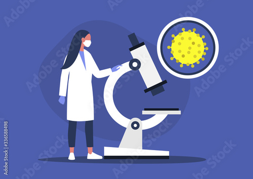 Young female scientist looking through the microscope, lab research,  coronavirus pandemic
