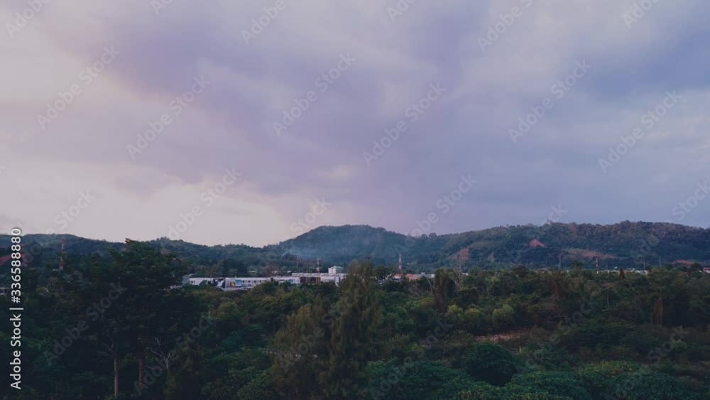 4K Epic time-lapse. Sunset time beyond the mountains colors the clouds first in blue then purple. Timelapse of stratus clouds at sunset 4K Epic time-lapse. Sunset time beyond the mountains colors the clouds first in blue then purple. Timelapse of stratus clouds at sunset