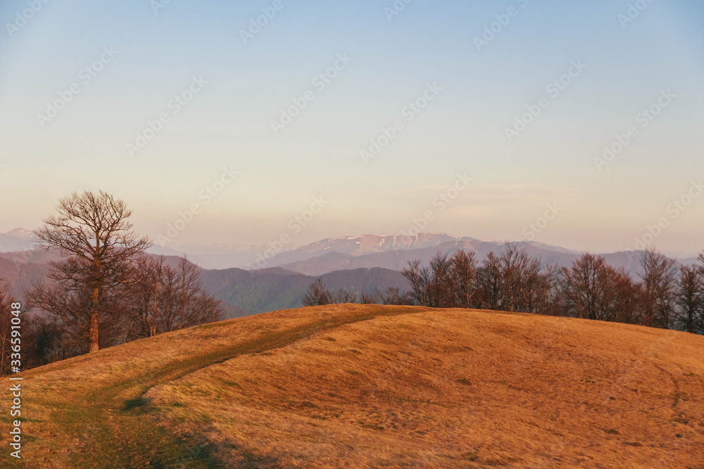 Beautiful Carpathians, mountains in clouds, waterfall, close-up, the sunsets beautifully over the mountains Beautiful Carpathians, mountains in clouds, waterfall, close-up, the sunsets beautifully over the mountains