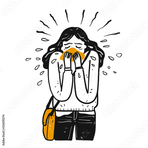 A sick girl is sneezing