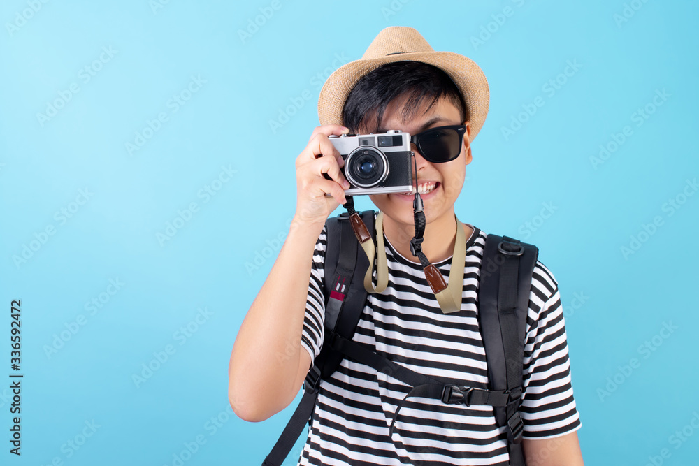 Tourists are taking pictures with film cameras and smiling in the studio. Tourists are taking pictures with film cameras and smiling in the studio.