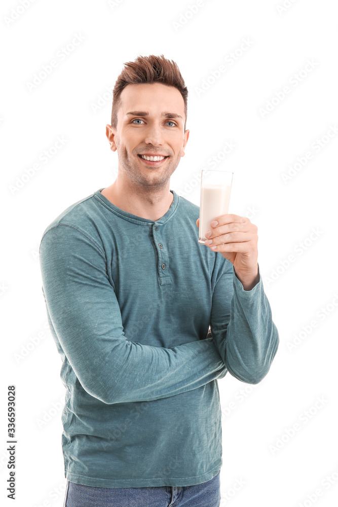 Young man with milk on white background Young man with milk on white background
