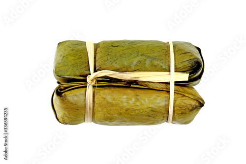 фотографія Boiled rice wrapped in banana leaver