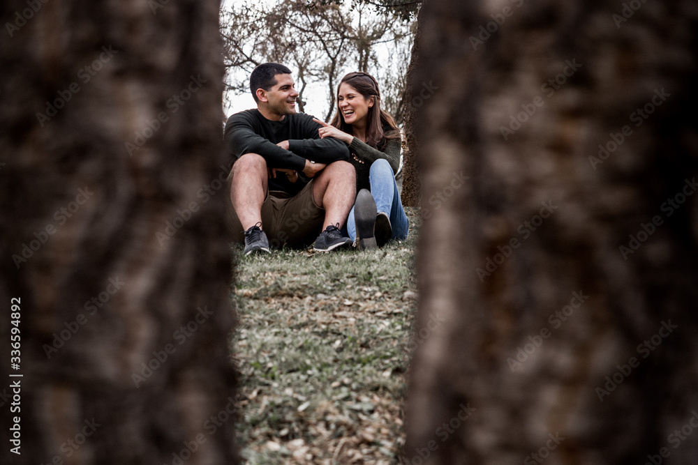 Fototapeta premium happy and loving couple sitting together