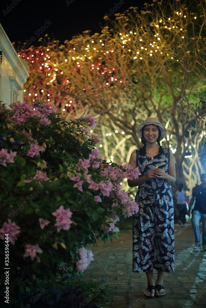 Women enjoying the decorative lights at Khao Wang, Phetchaburi, Thailand Women enjoying the decorative lights at Khao Wang, Phetchaburi, Thailand