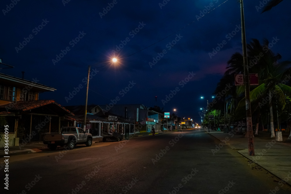 Naklejka premium Beautiful view of the Paseo de los turistas Dock Park (Parque Muellero) at night with the trees and beautiful lights