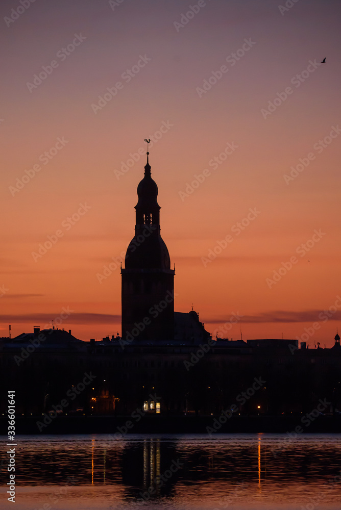 RIGA, LATVIA. 7th April 2020. Beautiful silhouettes of Riga city, during sunrise.