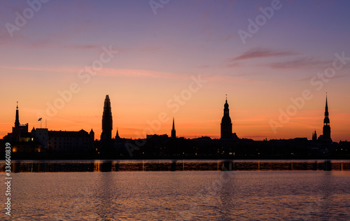 RIGA, LATVIA. 7th April 2020. Beautiful silhouettes of Riga city, during sunrise. © Gints