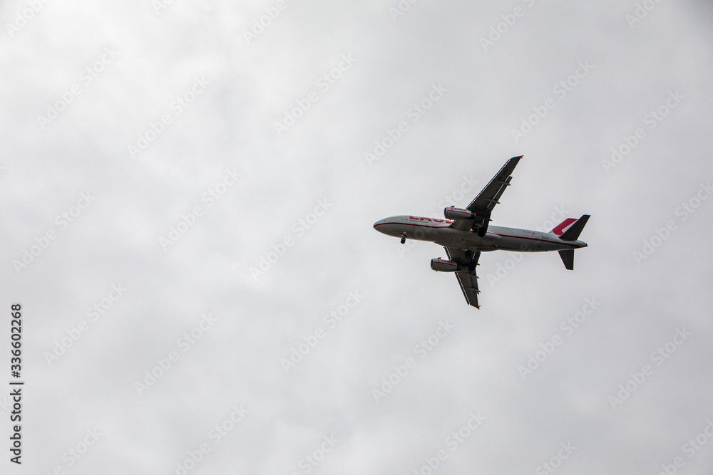 Fototapeta premium Pula, Croatia - May 19, 2019: big plane aircraft in overcast sky