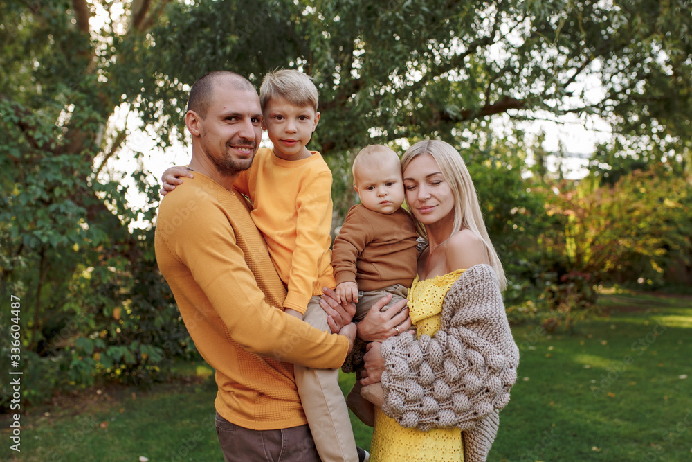 family in nature, summer or autumn, green grass trees in green leaves, a pond in nature, mom blonde in a yellow dress, dad, husband, older son and youngest son, two children, a large and happy family
family in nature, summer or autumn, green grass trees in green leaves, a pond in nature, mom blonde in a yellow dress, dad, husband, older son and youngest son, two children, a large and happy family