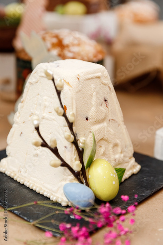 Easter orthodox sweet bread kulich cottage cheese cake with chocolate eggs